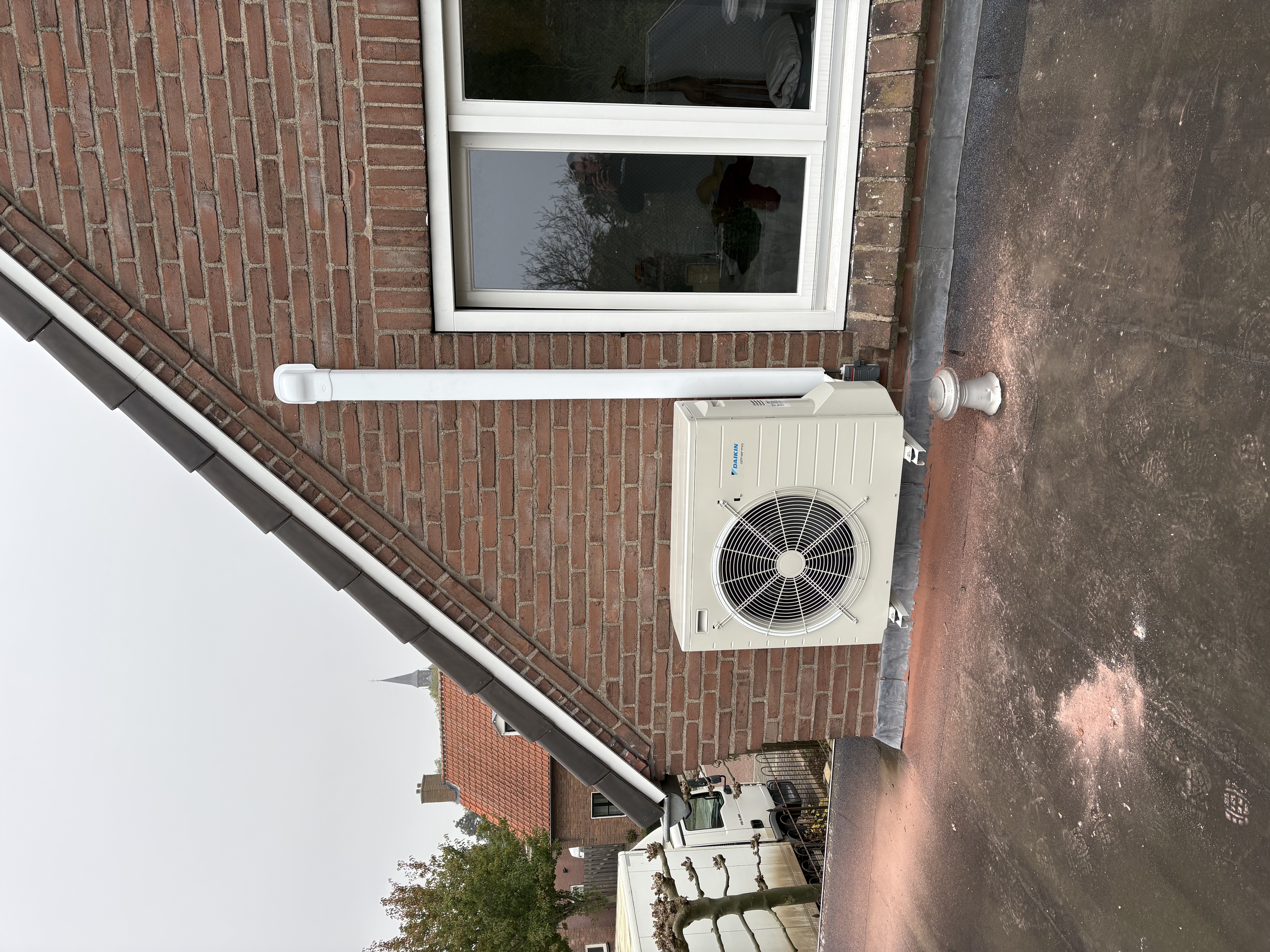 Daikin buitenunit dak